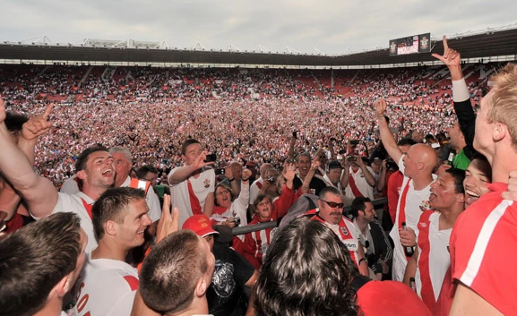  Early success: It's the end of Adkins's first season in charge and Southampton are promoted from League 1 to the Championship in 2011 much to the delight of the fans 